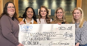 Check Presentation from The Give Back Winner to Dress for Success